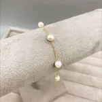 عکس دستبند زنجیر و مروارید طلا