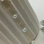 عکس دستبند طلا کلاسیک مروارید دار