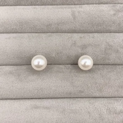 عکس گوشواره میخی طلا مروارید دار