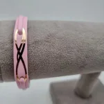 عکس دستبند چرم صورتی امگا طلا