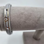 عکس دستبند امگا چرم طلا