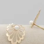 گوشواره طلا مرواریدی طرح گل لوتوس کلاسیک