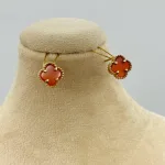 عکس گوشواره طلا ونکلیف زنانه و دخترانه طرح گل با عقیق قرمز