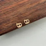 قیمت گوشواره میخی لیزری ه نیمانی طلا زنانه و دخترانه طلای 18 عیار