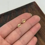 قیمت گوشواره میخی لیزری لوتوس طلا زنانه و دخترانه نمادار