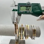 عکس النگو رزگلد و طلا سفید طرح فیوژن استخوانی صدفی زنانه و دخترانه نمادار