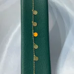 عکس دستبند طلا مونیک آویزدار زنانه و دخترانه شیک و سبک