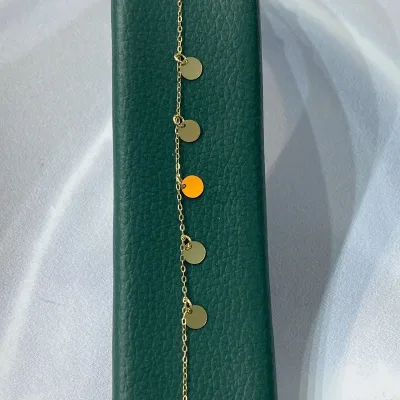 عکس دستبند طلا مونیک آویزدار زنانه و دخترانه شیک و سبک