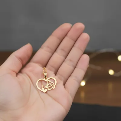 عکس پلاک طلا لیزری طرح مادر و قلب ظریف و گرم پایین