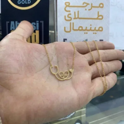 قیمت گردنبند طلا گوشی پزشکی و ضربان قلب روز پرستار و پزشک 18 عیار با وزن حدود یک گرم