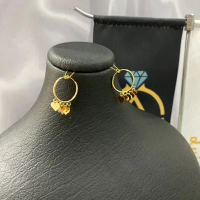عکس مدل گوشواره طلا حلقه ای‌ پولکی قلب زنانه و دخترانه مجلسی 18 عیار یک گرمی