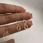 قیمت گوشواره طلا بخیه ای بی نهایت ظریف زنانه و دخترانه 18 عیار سبک