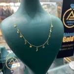 قیمت زنجیر طلا آویز دار ستاره و ماه بدون اجرت و دست دوم زنانه و دخترانه حدود 2 گرم